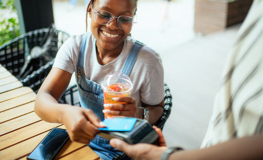 Lady making a purchase with a credit card