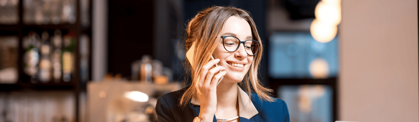 Young female professional is on the phone.